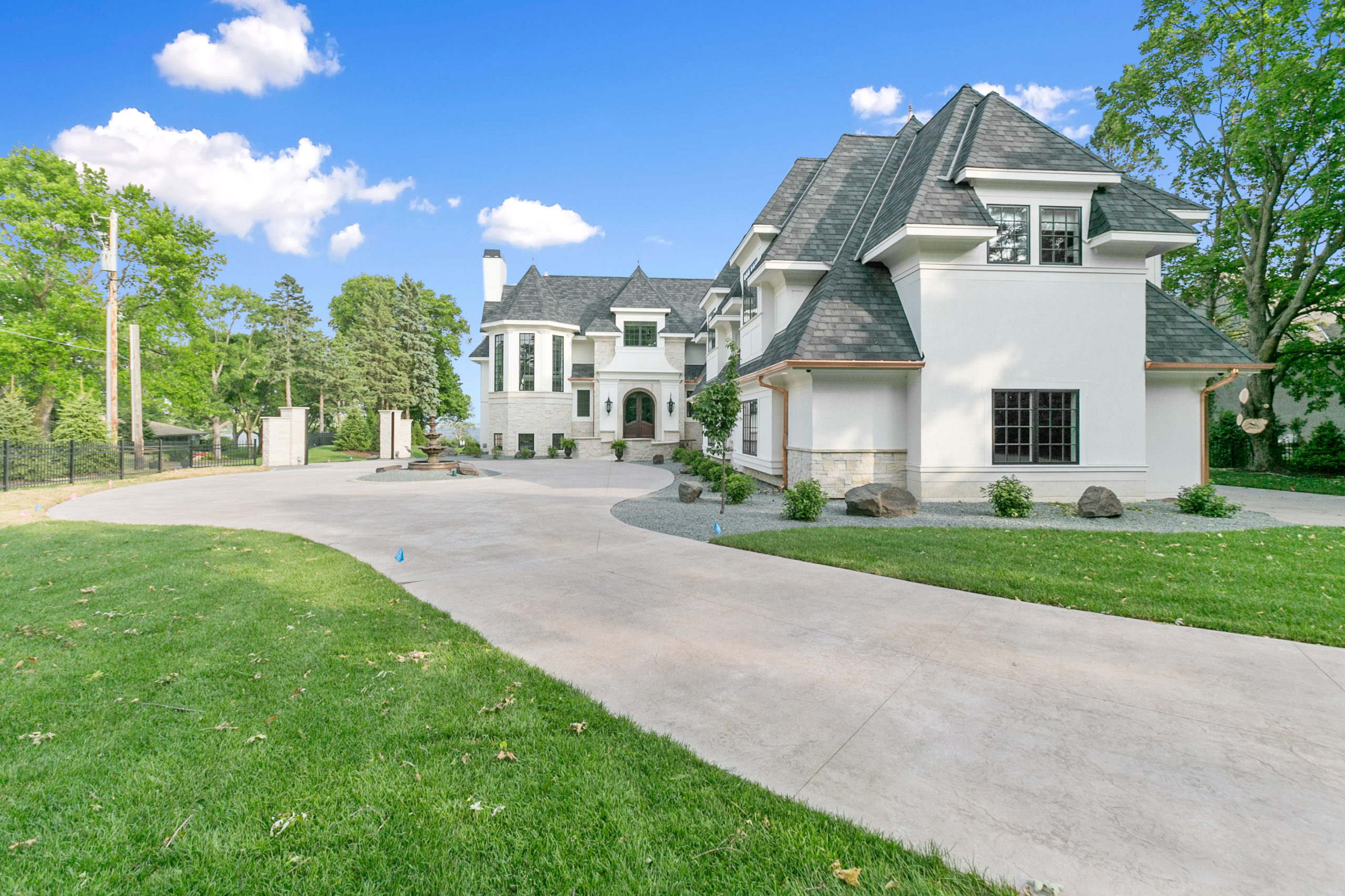 Traditional home exterior with mature landscaping